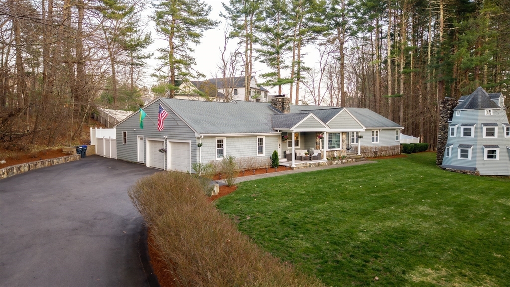 329 Orchard Street Millis, MA 02054 - Photo 39 of 42 a view of house with garden and trees
