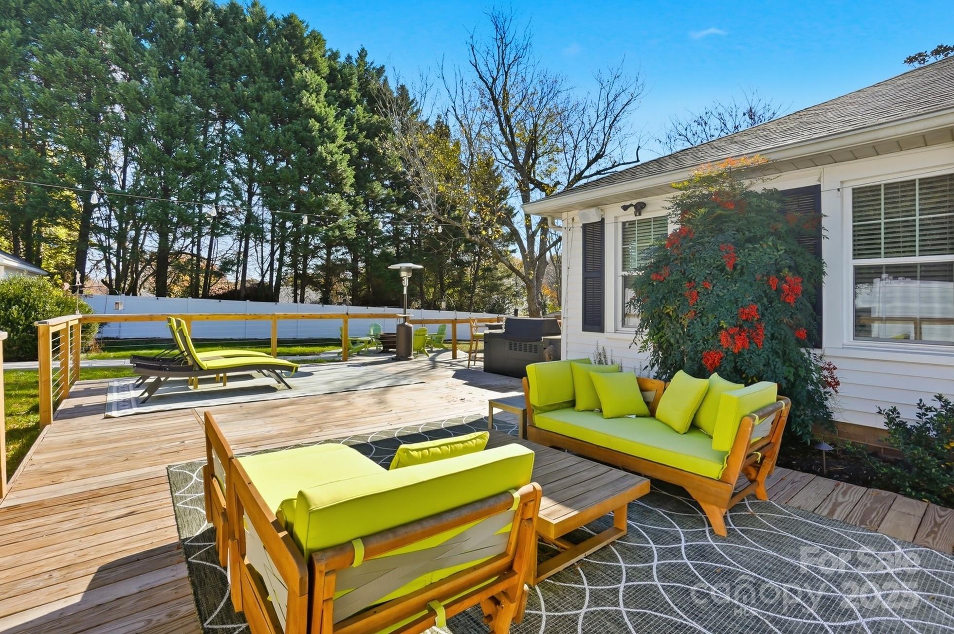 708 Mable Avenue Kannapolis, NC 28083 - Photo 32 of 48 a view of a chairs and table in the backyard
