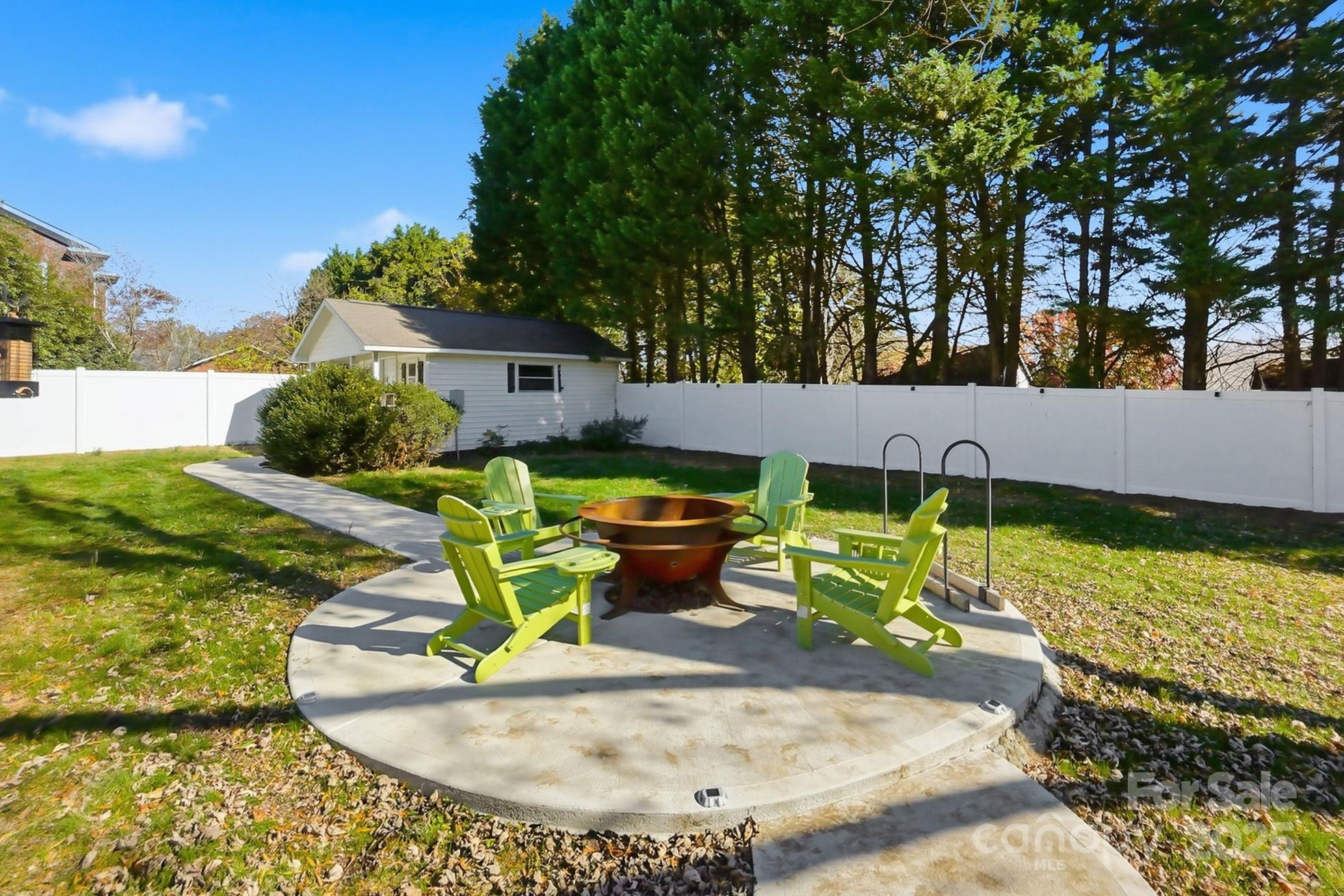 708 Mable Avenue Kannapolis, NC 28083 - Photo 35 of 48 a view of a backyard with plants and patio