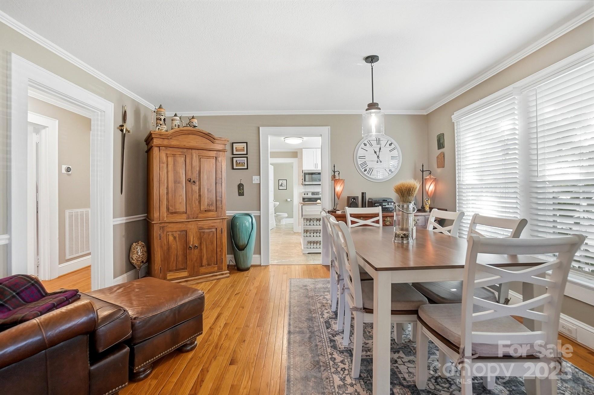 708 Mable Avenue Kannapolis, NC 28083 - Photo 6 of 48 a view of a a dining room with furniture window and wooden floor