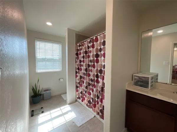 a view of a hallway with a couch