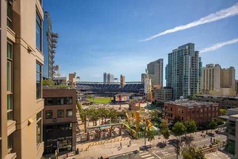 a front view of a house with outdoor seating