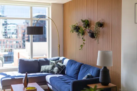 a living room with furniture and a table