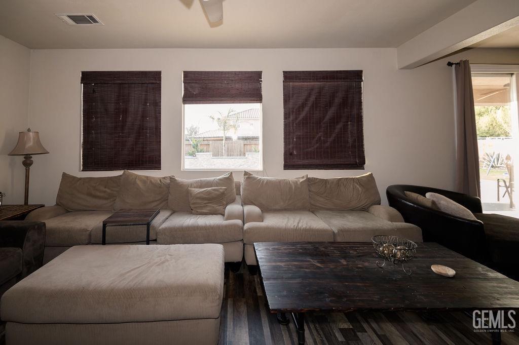 Undisclosed Address Bakersfield, CA 93314 - Photo 20 of 54 a living room with furniture and a window