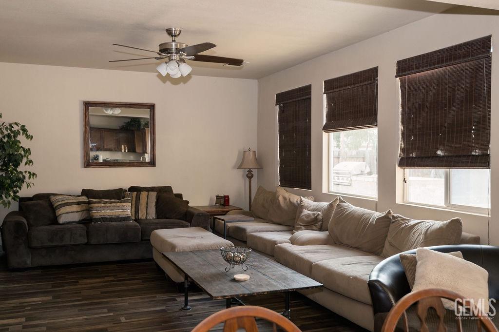 Undisclosed Address Bakersfield, CA 93314 - Photo 21 of 54 a living room with furniture and a window