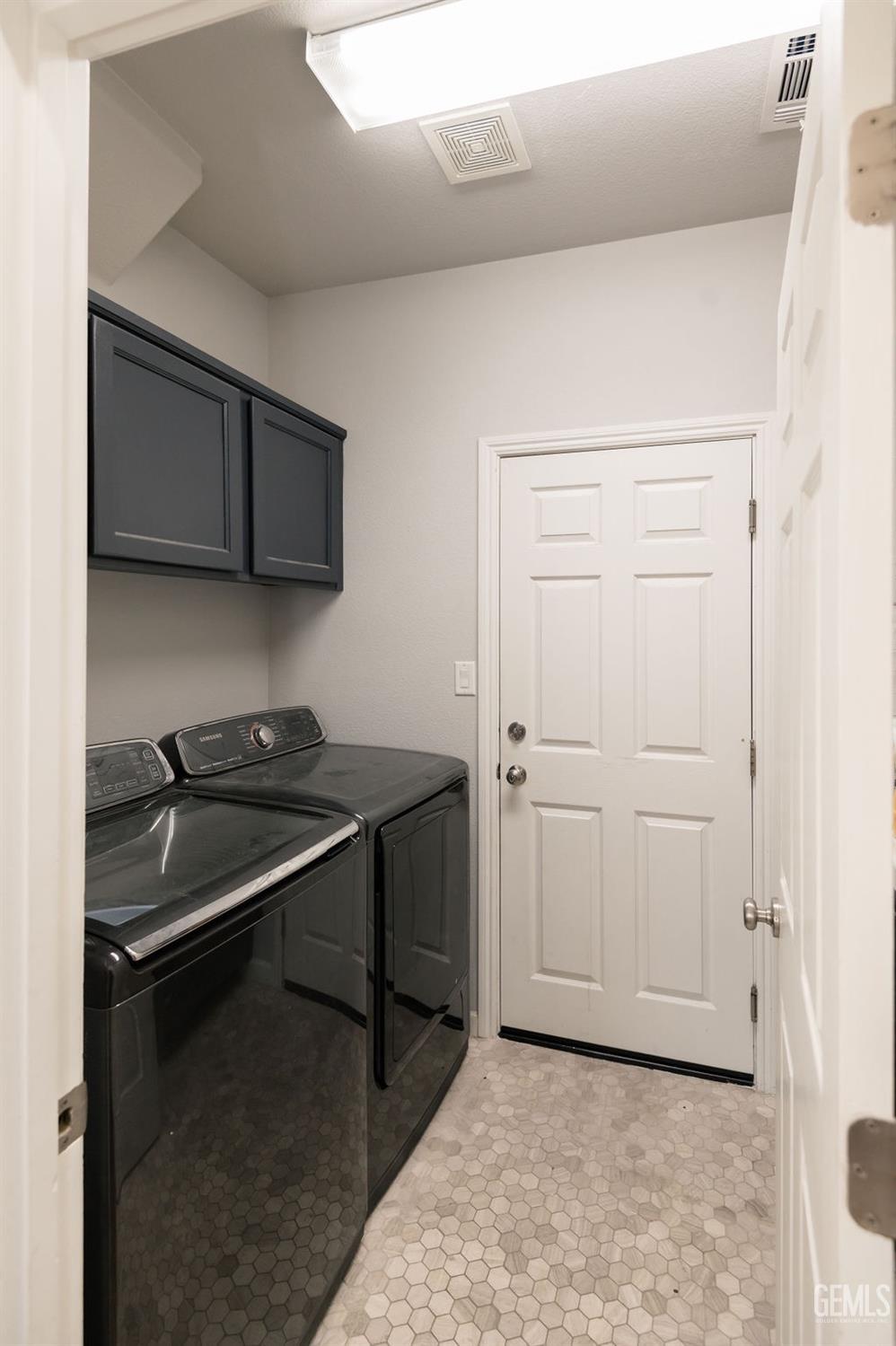 Undisclosed Address Bakersfield, CA 93314 - Photo 24 of 54 a kitchen that has a sink and a stove