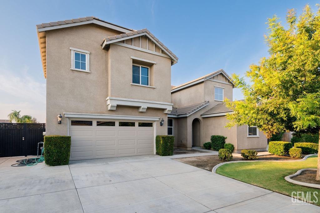 Undisclosed Address Bakersfield, CA 93314 - Photo 3 of 54 a view of a house with a patio