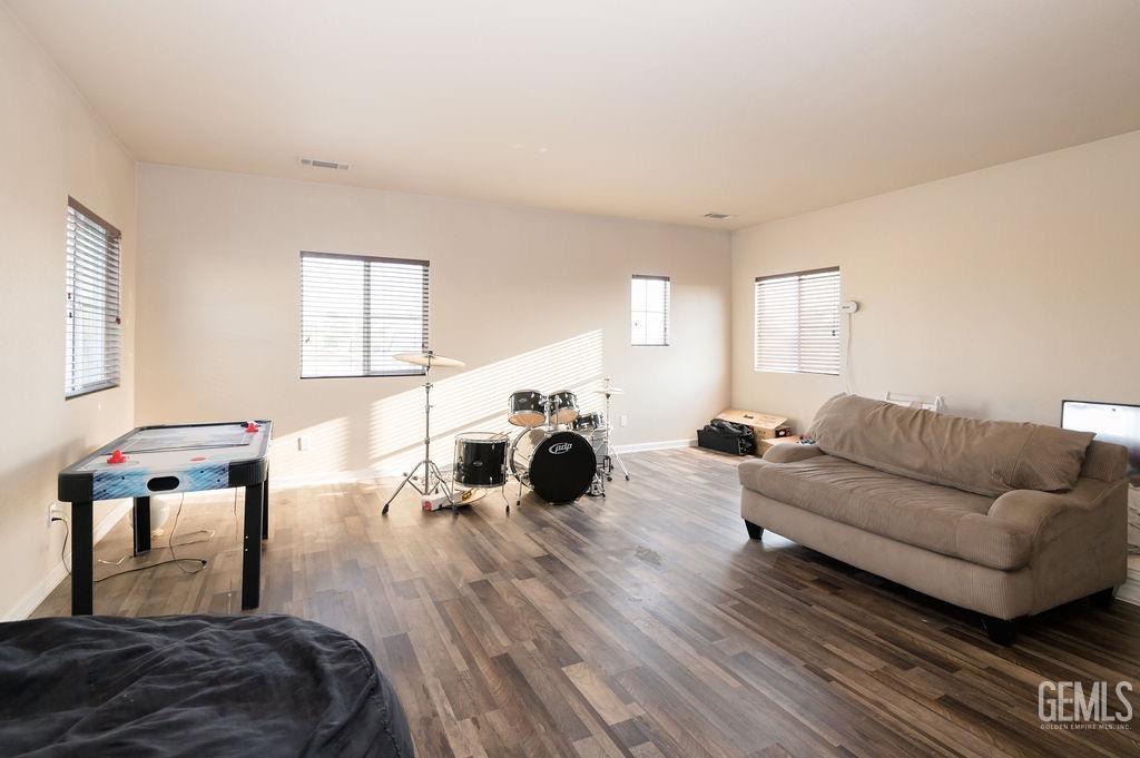 Undisclosed Address Bakersfield, CA 93314 - Photo 37 of 54 a living room with furniture and a large window