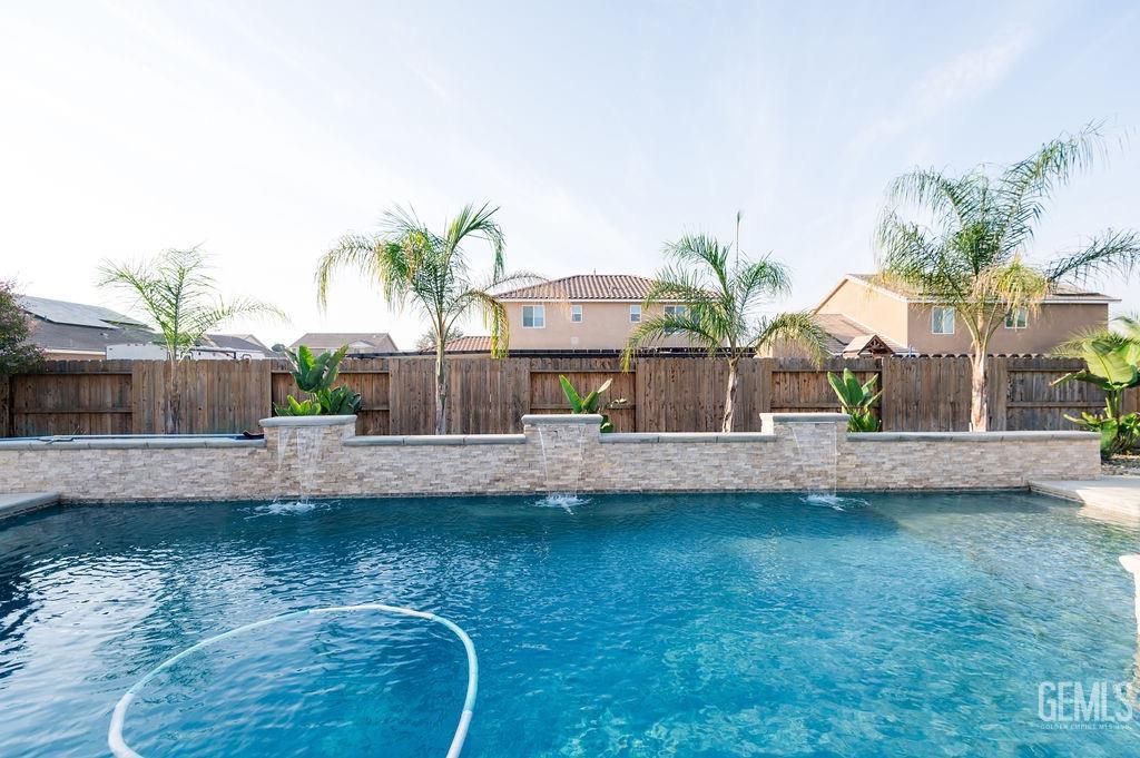 Undisclosed Address Bakersfield, CA 93314 - Photo 38 of 54 a view of a house with a yard