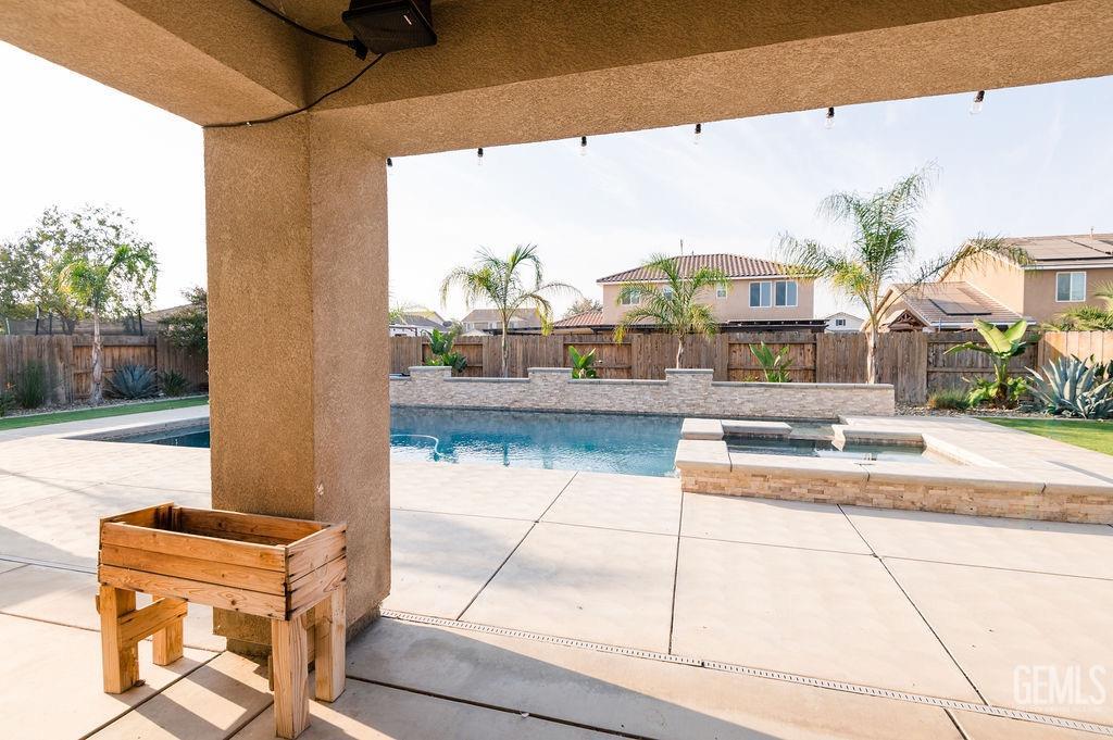 Undisclosed Address Bakersfield, CA 93314 - Photo 42 of 54 a building outdoor space with patio furniture