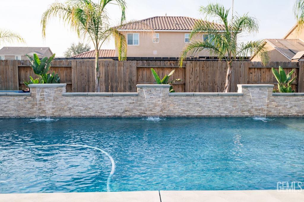 Undisclosed Address Bakersfield, CA 93314 - Photo 44 of 54 a view of a house with a yard