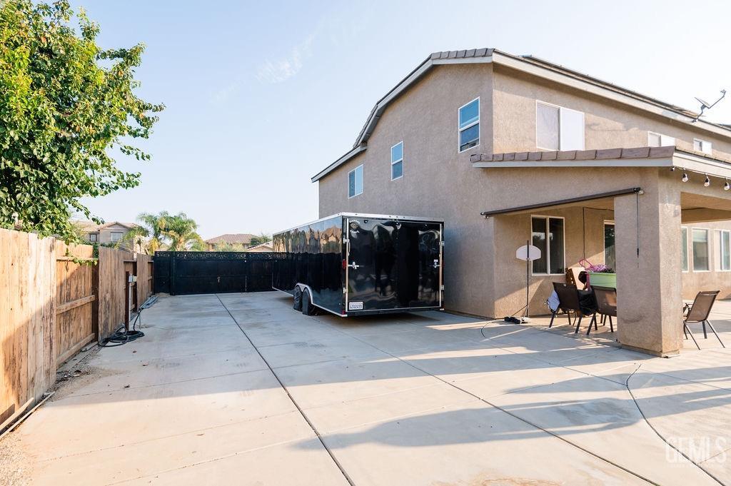 Undisclosed Address Bakersfield, CA 93314 - Photo 49 of 54 a view of a car park in front of house
