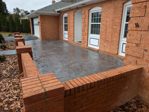a view of a deck with wooden floor and barbeque oven