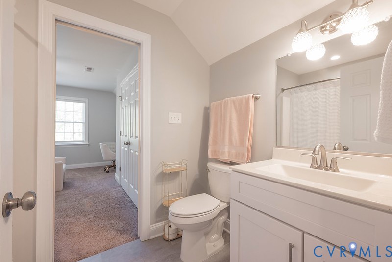9425 Marie Road New Kent, VA 23124 - Photo 21 of 55 a bathroom with a sink a toilet and shower
