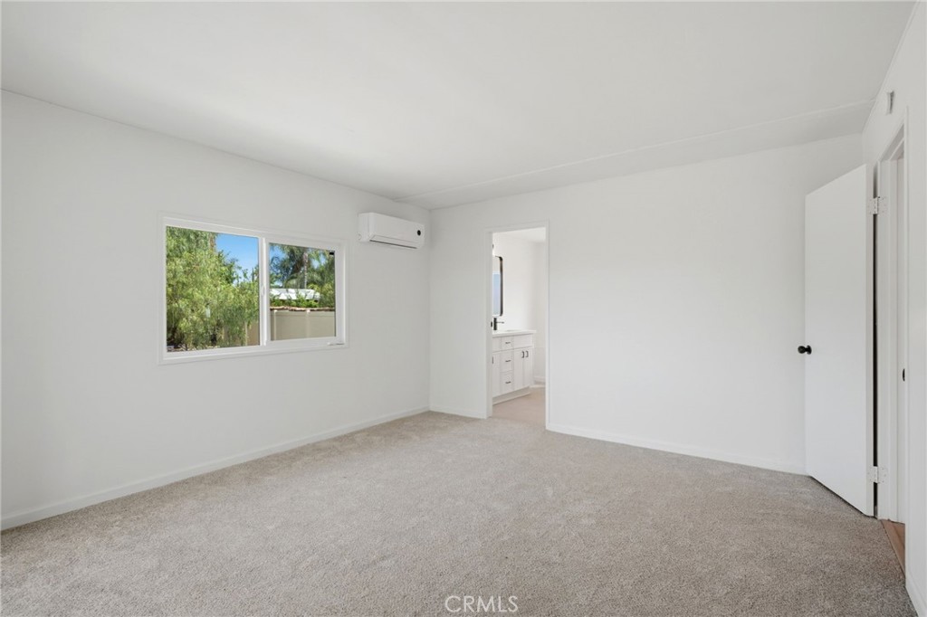 33098 Finch Street Winchester, CA 92596 - Photo 11 of 36 a view of an empty room with a window