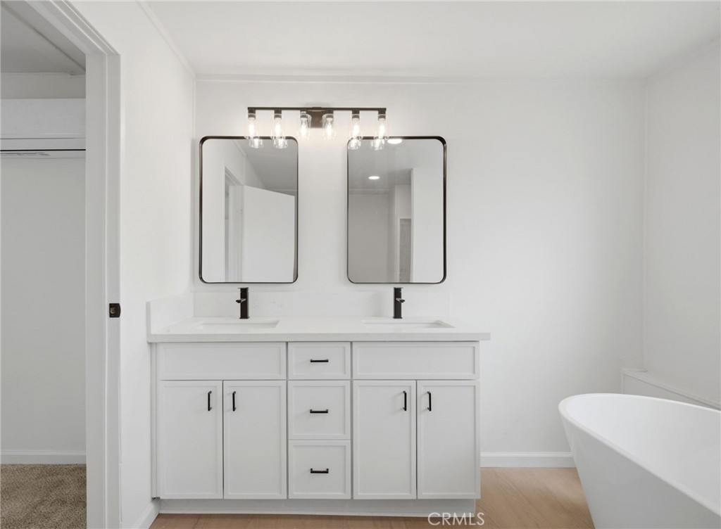33098 Finch Street Winchester, CA 92596 - Photo 15 of 36 a bathroom with a toilet sink and mirror
