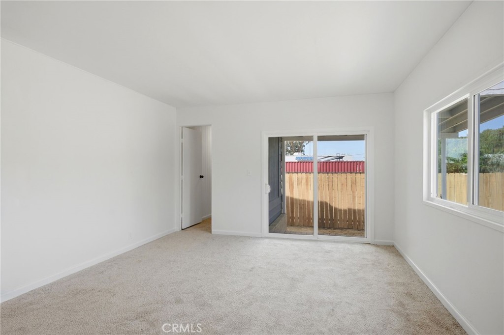 33098 Finch Street Winchester, CA 92596 - Photo 17 of 36 an empty room with windows