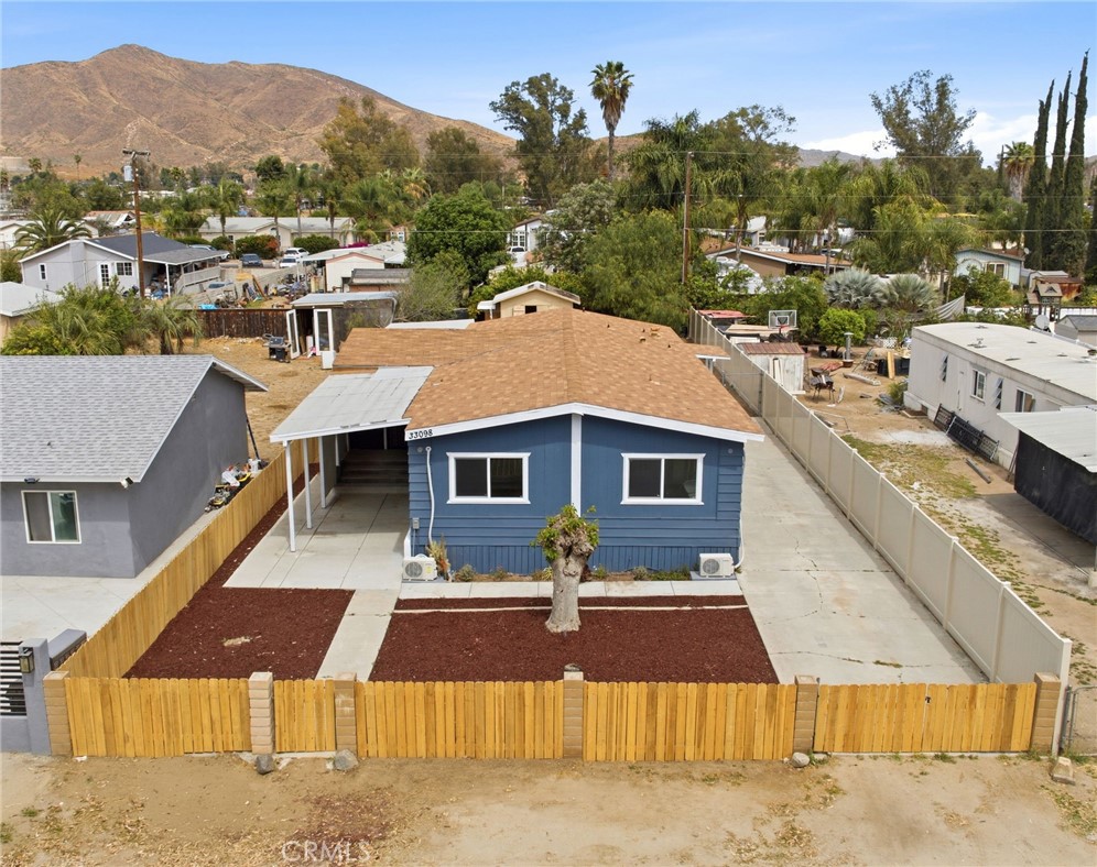 33098 Finch Street Winchester, CA 92596 - Photo 2 of 36 a front view of a house with a yard