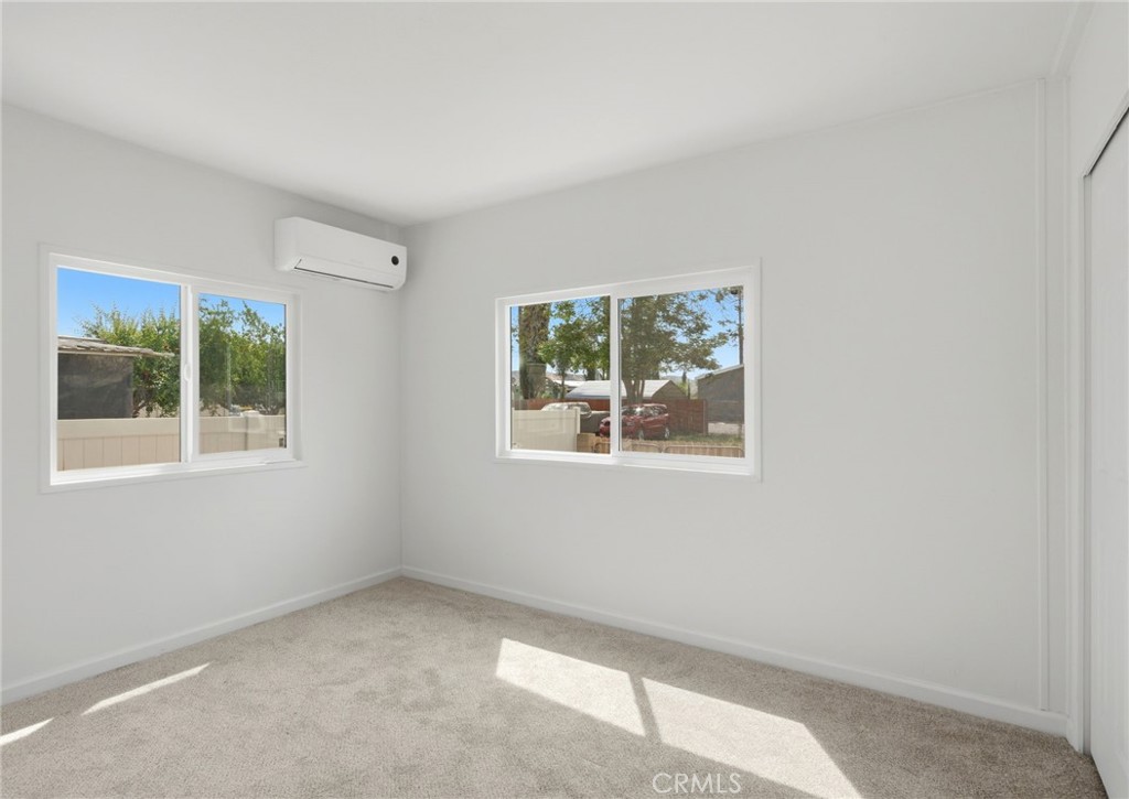 33098 Finch Street Winchester, CA 92596 - Photo 23 of 36 an empty room with a window