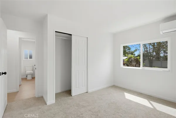 an empty room that has a window