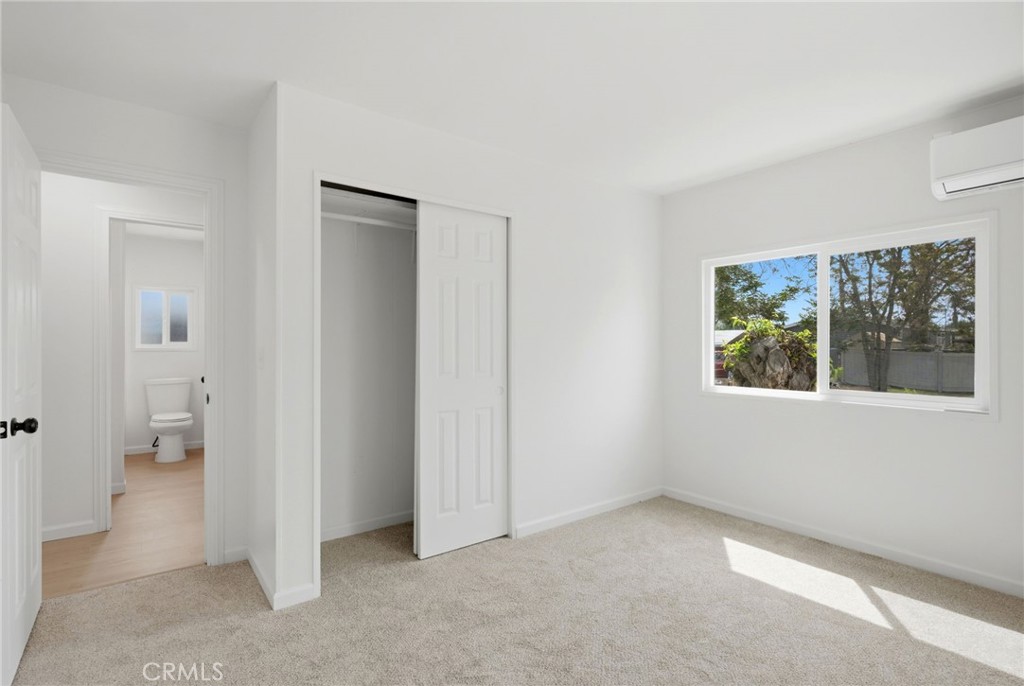 33098 Finch Street Winchester, CA 92596 - Photo 29 of 36 an empty room that has a window