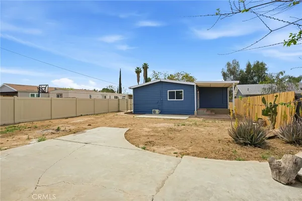 a view of a backyard of a house