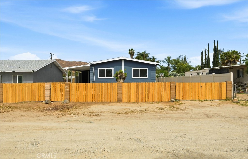33098 Finch Street Winchester, CA 92596 - Photo 36 of 36 a view of a house with a swimming pool