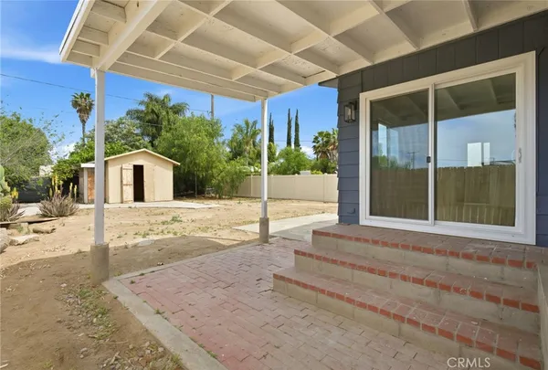 a house view with a outdoor space