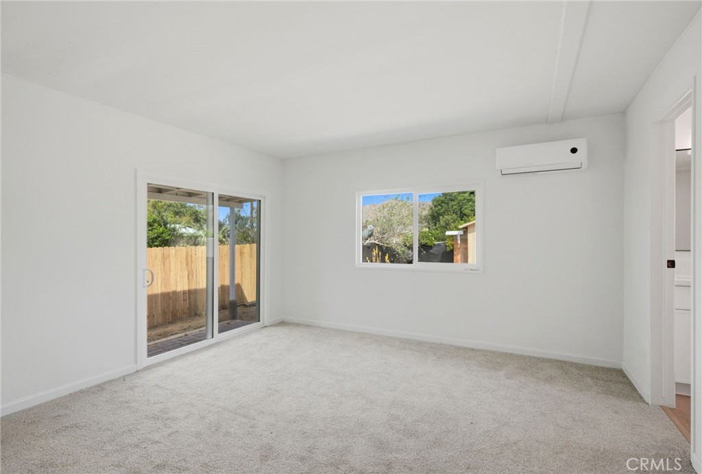 33098 Finch Street Winchester, CA 92596 - Photo 10 of 36 an empty room with windows