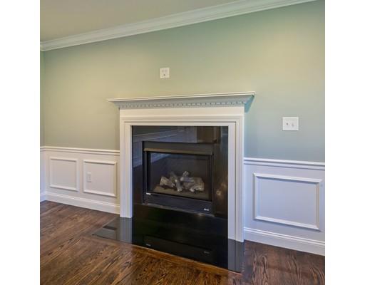 320 Boston Road Chelmsford, MA 01824 - Photo 12 of 30 a living room with a fireplace
