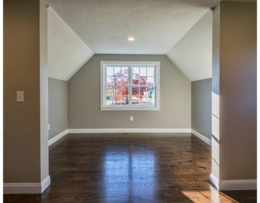320 Boston Road Chelmsford, MA 01824 - Photo 16 of 30 an empty room with wooden floor and windows