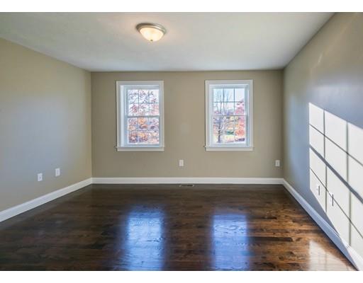 320 Boston Road Chelmsford, MA 01824 - Photo 18 of 30 an empty room with wooden floor and windows