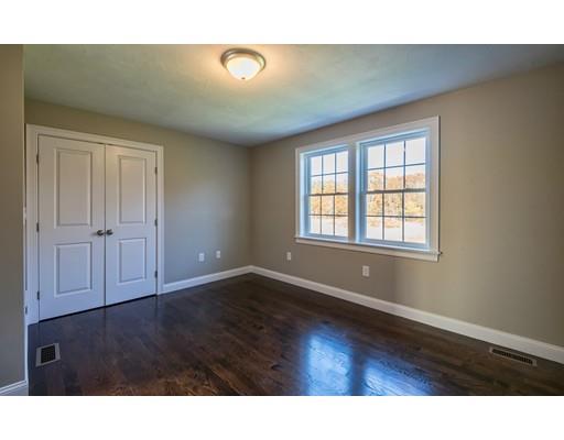 320 Boston Road Chelmsford, MA 01824 - Photo 19 of 30 a view of an empty room with wooden floor and a window
