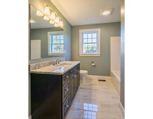 320 Boston Road Chelmsford, MA 01824 - Photo 22 of 30 a spacious bathroom with a tub sink and mirror