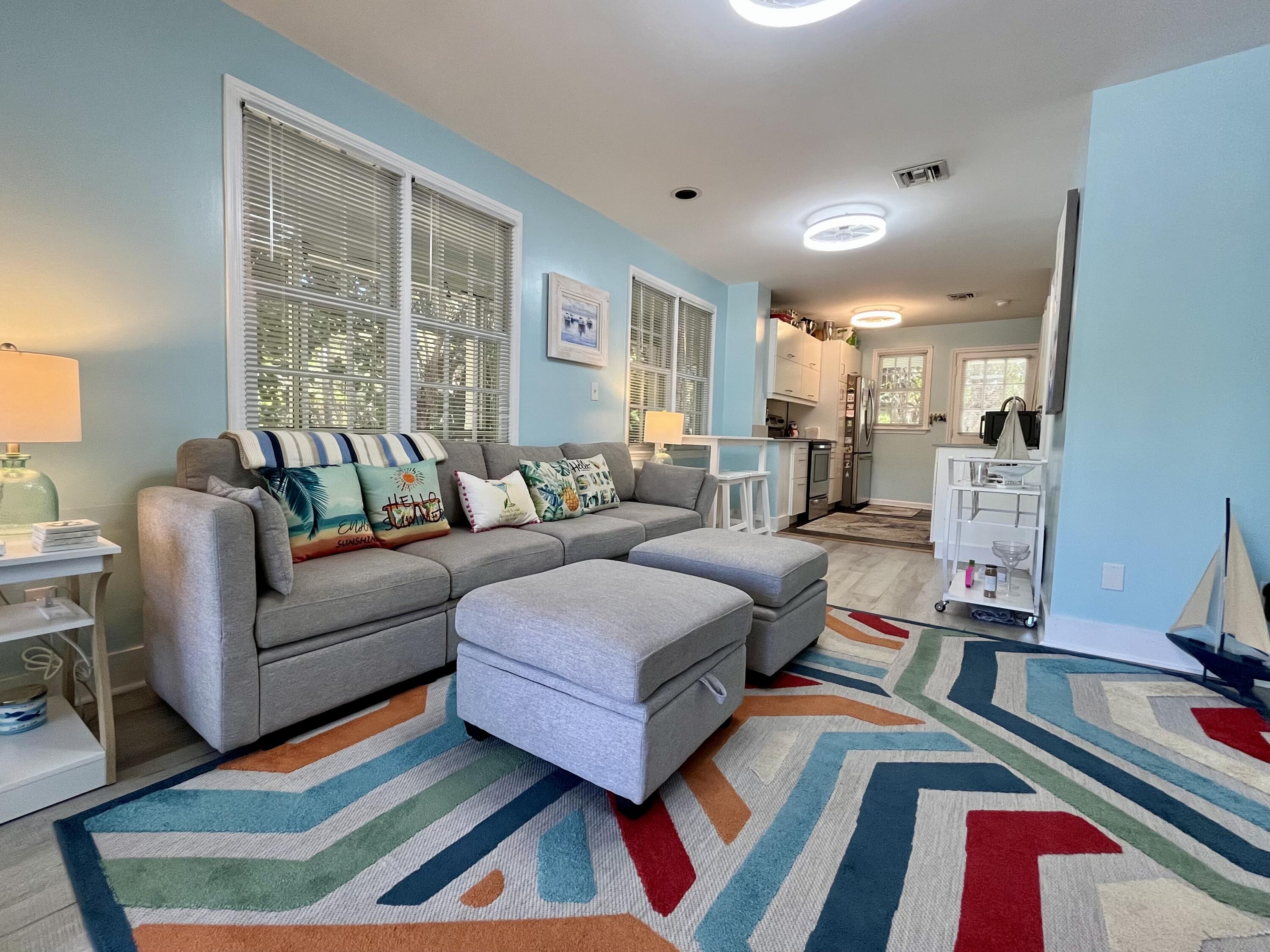 68 Merganser Lane Key West, FL 33040 - Photo 11 of 21 a living room with furniture and a large window