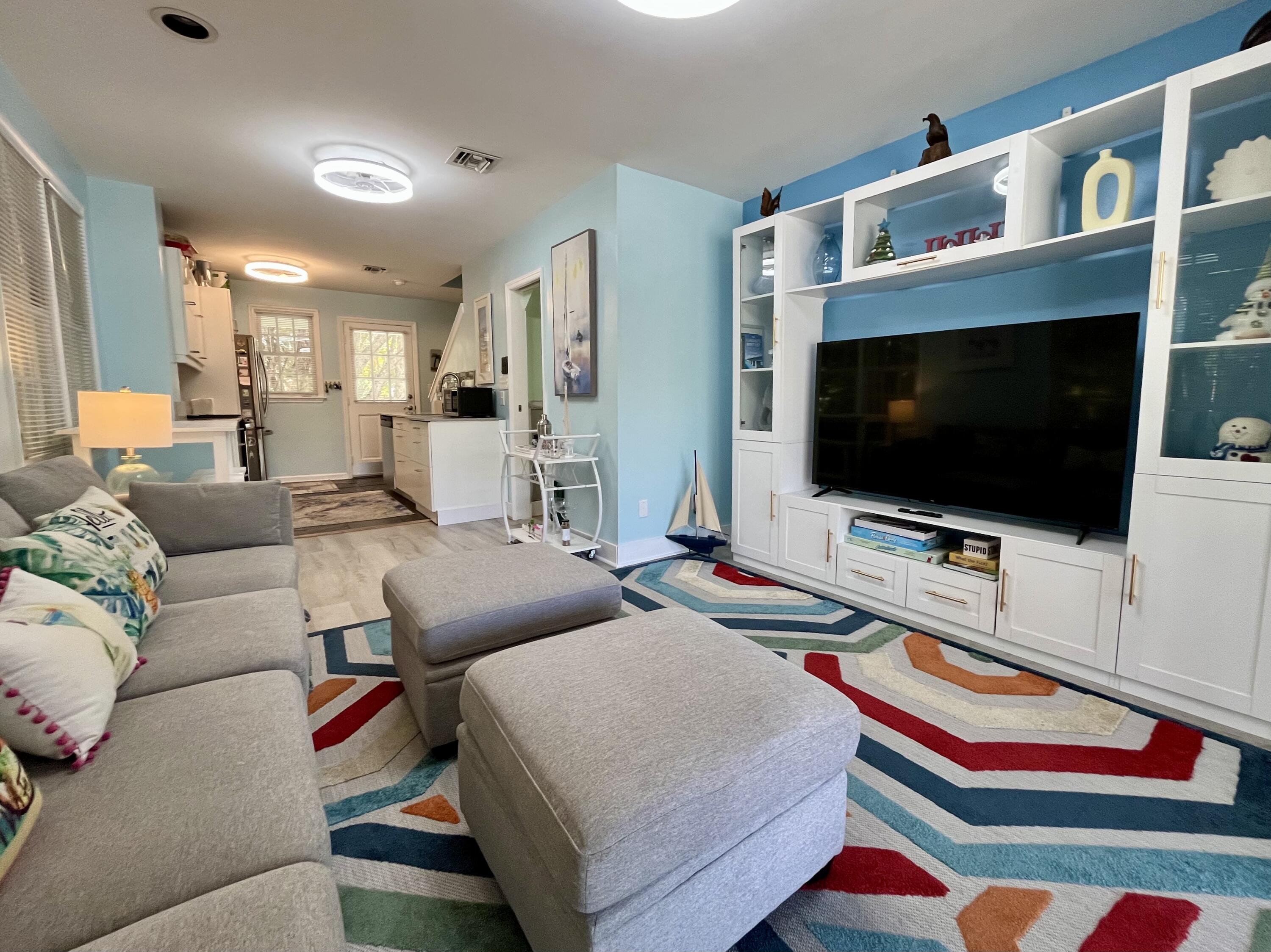 68 Merganser Lane Key West, FL 33040 - Photo 12 of 21 a living room with furniture and a flat screen tv