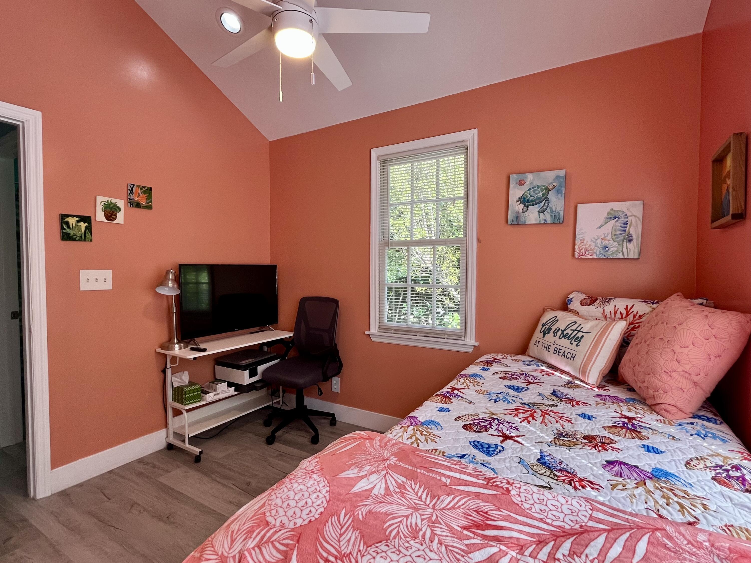 68 Merganser Lane Key West, FL 33040 - Photo 17 of 21 a bedroom with a bed and a flat screen tv