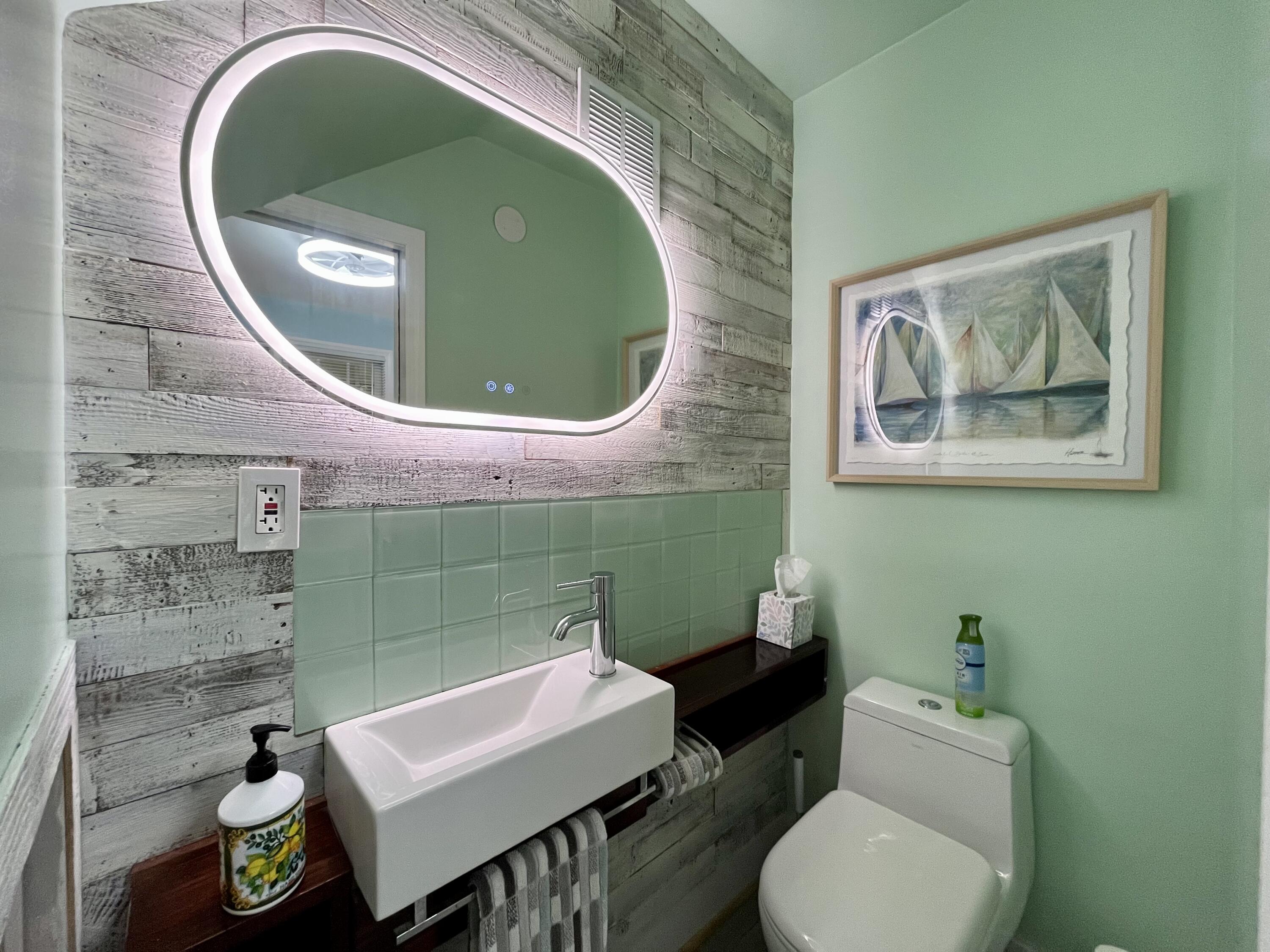 68 Merganser Lane Key West, FL 33040 - Photo 10 of 21 a bathroom with a toilet and a sink