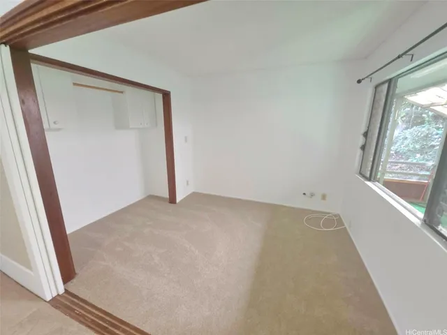 a view of hallway with shower