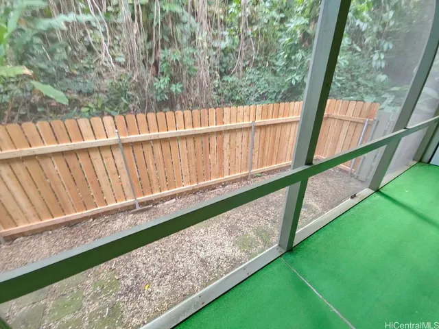 a view of an entryway with garden