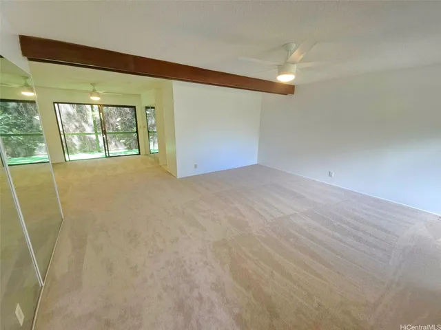 a view of a hallway with windows