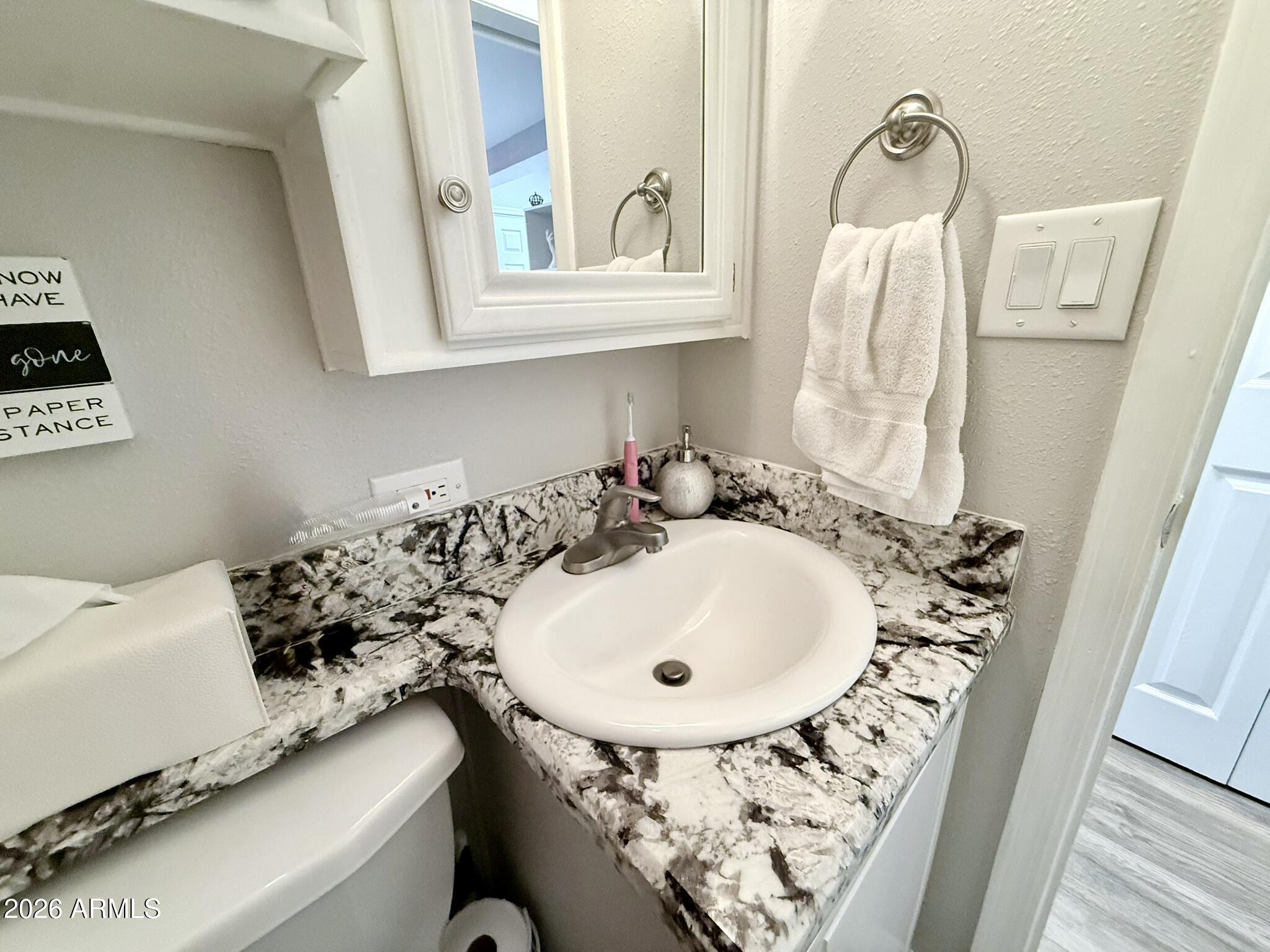 8865 East Baseline Road, Unit 1010 Mesa, AZ 85209 - Photo 27 of 57 Hall Bathroom with Granite Countertops