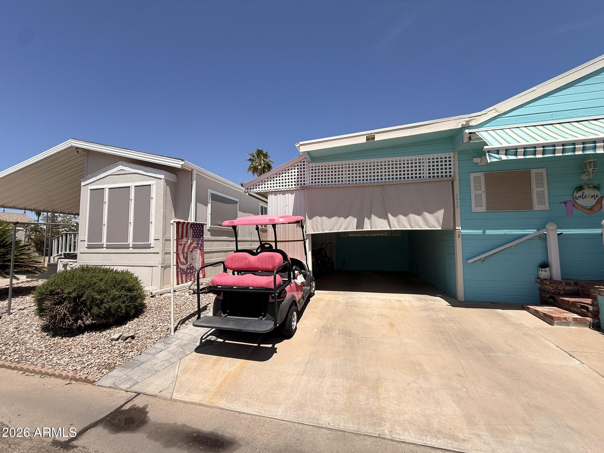 8865 East Baseline Road, Unit 1010 Mesa, AZ 85209 - Photo 38 of 57 Golf Car parking at carport