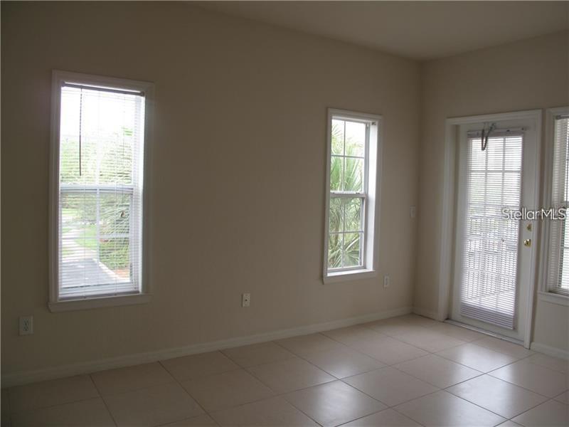 3593 Conroy Road, Unit 421 Orlando, FL 32839 - Photo 12 of 28 an empty room with windows