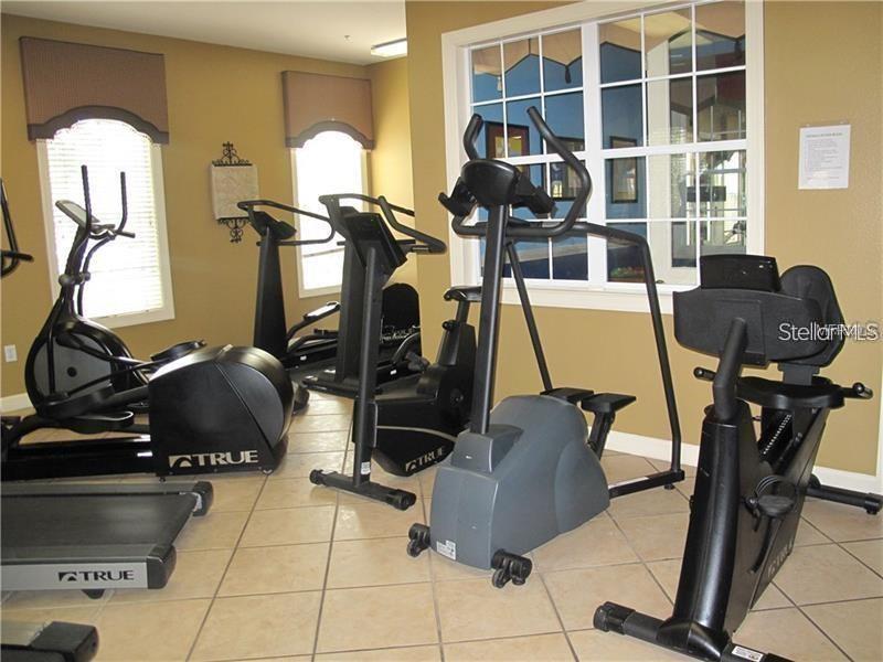 3593 Conroy Road, Unit 421 Orlando, FL 32839 - Photo 20 of 28 a living room with furniture and a window