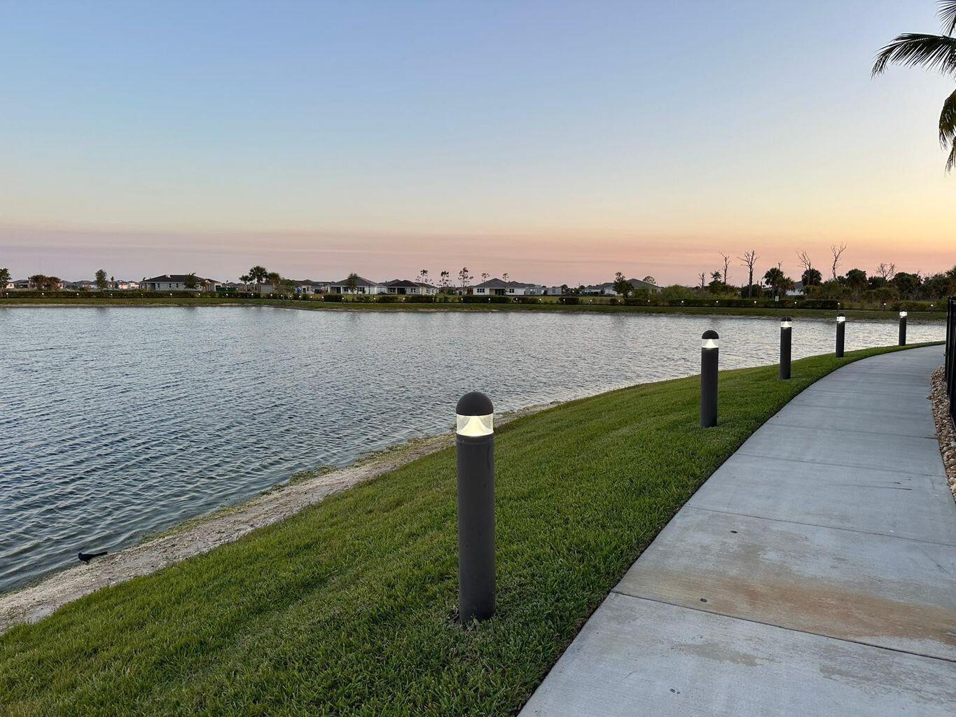 13897 Southwest Gingerline Drive Port St. Lucie, FL 34987 - Photo 15 of 74 a park view with a lake view
