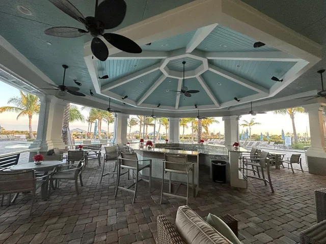 a house view with a sitting space and garden space