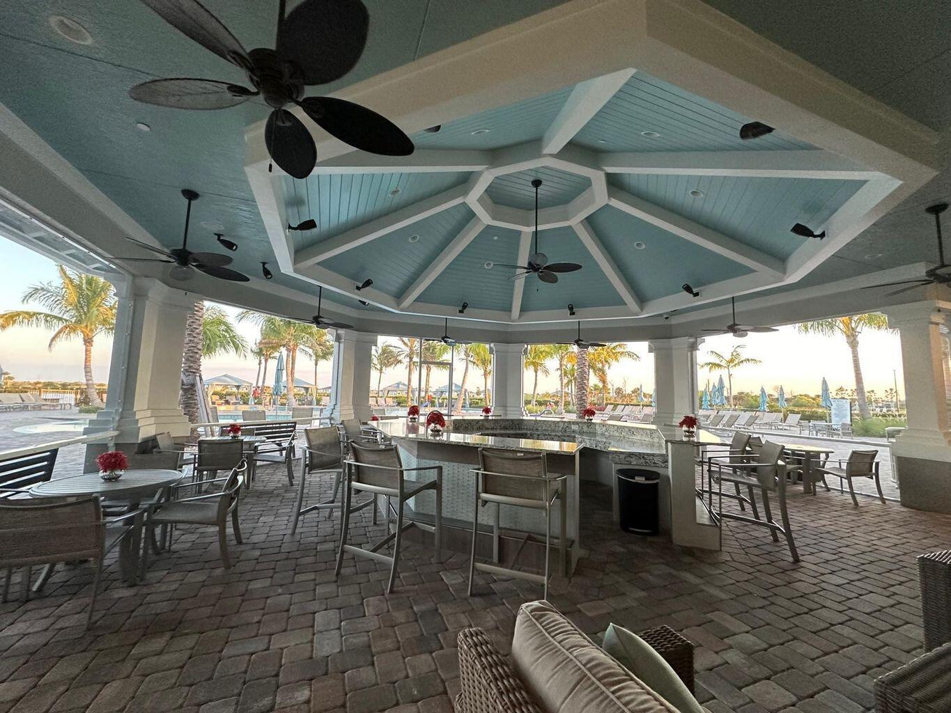 13897 Southwest Gingerline Drive Port St. Lucie, FL 34987 - Photo 18 of 74 a view of a dining room with furniture window and outside view