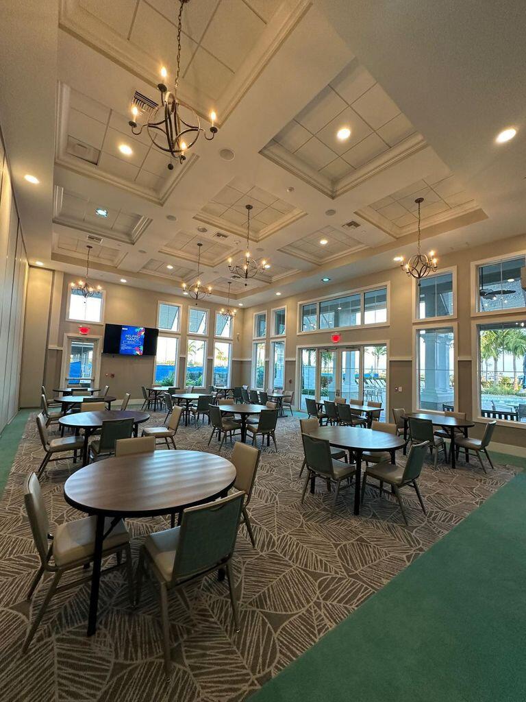 13897 Southwest Gingerline Drive Port St. Lucie, FL 34987 - Photo 21 of 74 a view of a dining room with furniture