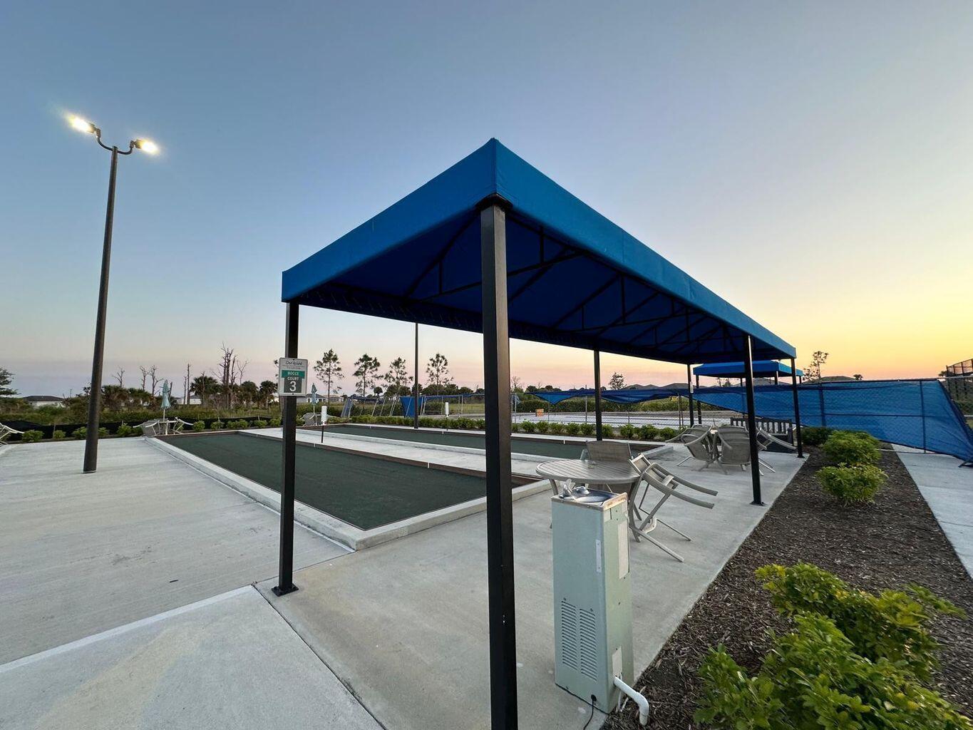 13897 Southwest Gingerline Drive Port St. Lucie, FL 34987 - Photo 28 of 74 a view of a terrace with chairs